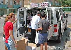 Handing out food to residents