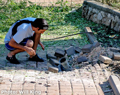 Resident with impacted Katyusha rocket